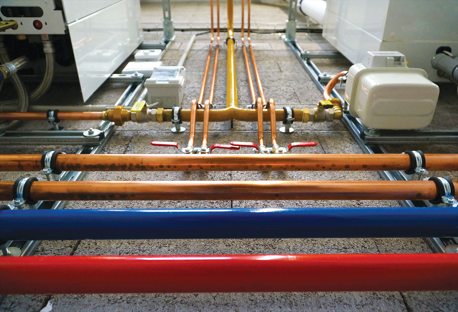 Gas and water pipes in a commercial building.