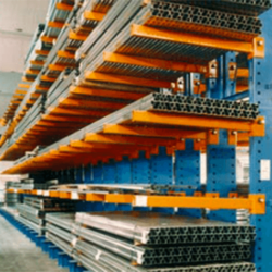 Cantilever racking used to store lengths of metal.